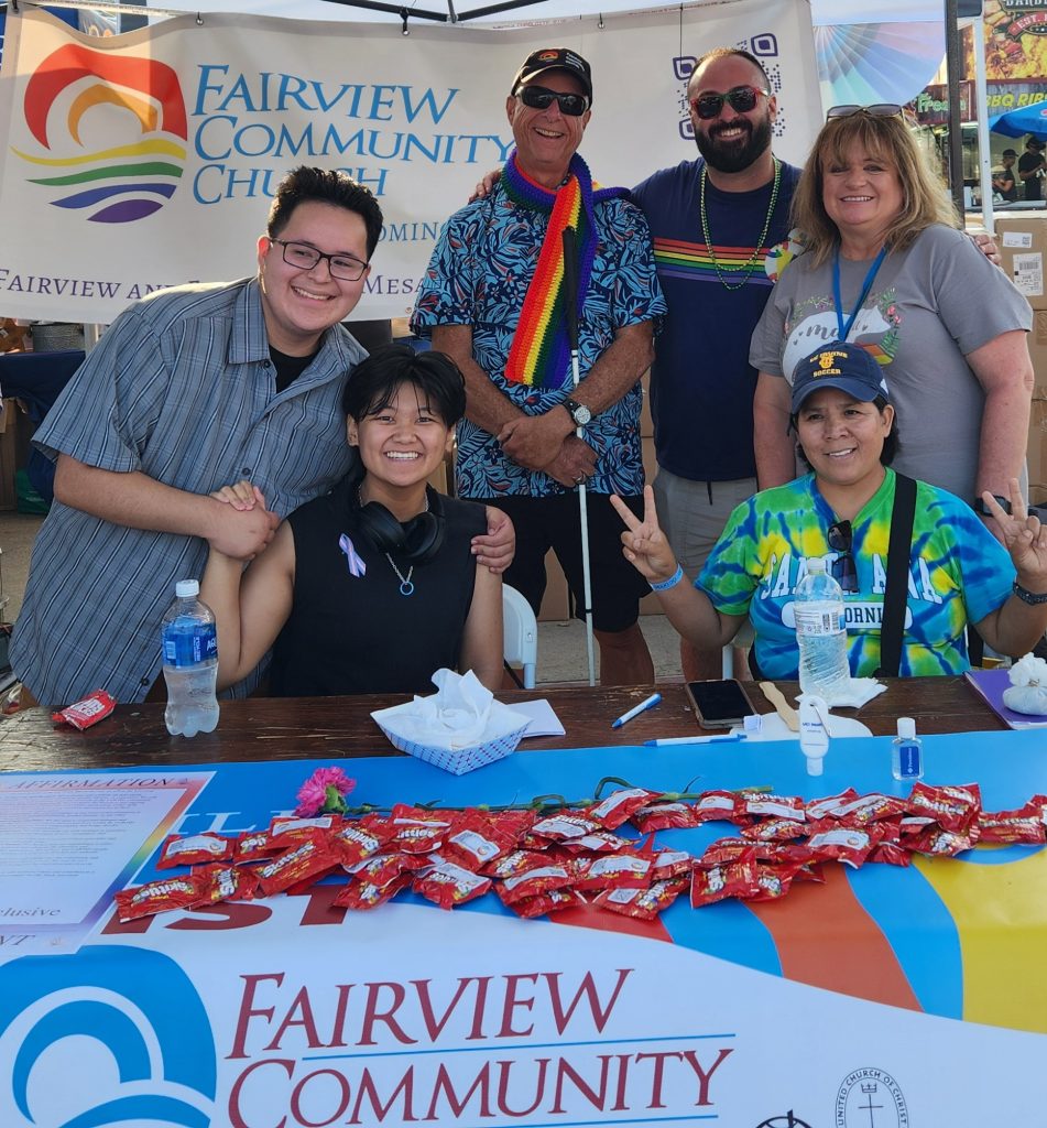 Picture of FCC tablers behind the FCC table at OC Pride.